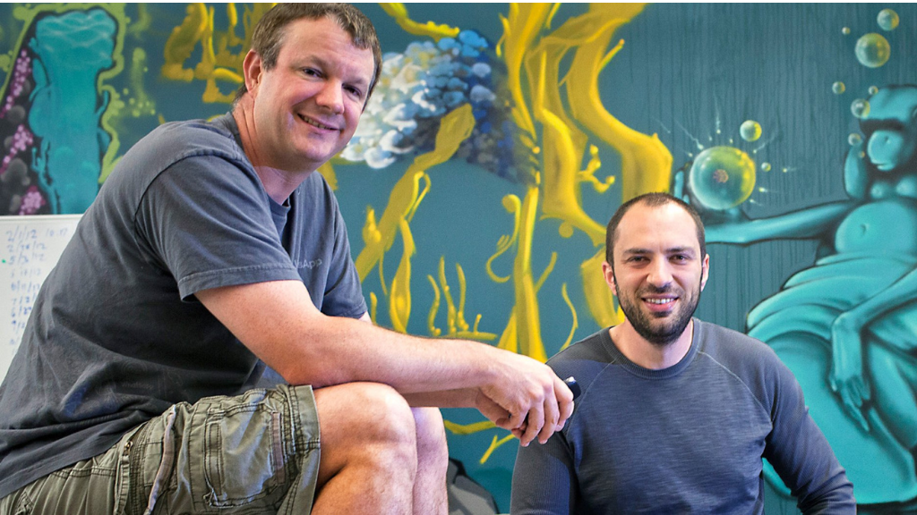 Jan Koum meeting with WhatsApp co-founder Brian Acton, discussing their journey in building the messaging platform.