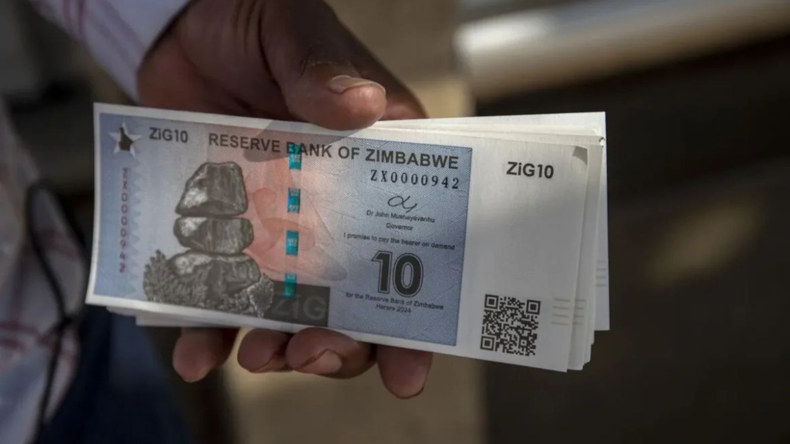 An image depicting the introduction and crisis of the post-independence Zimbabwe Dollar, showcasing the evolution of the currency and the economic situation.