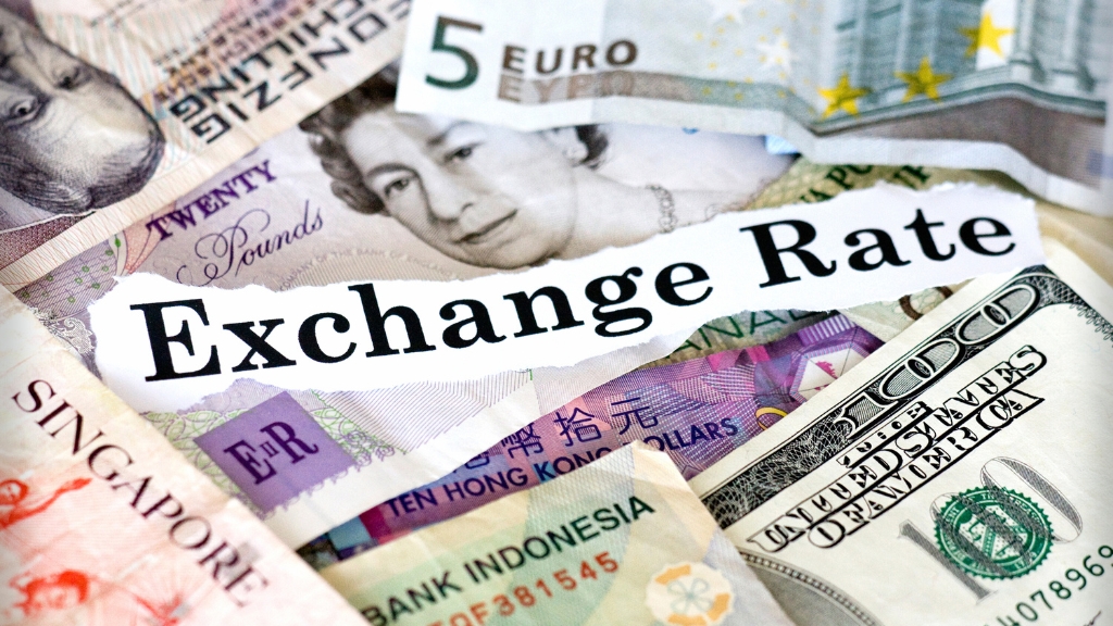 The process of determining exchange rates in a money exchange business.